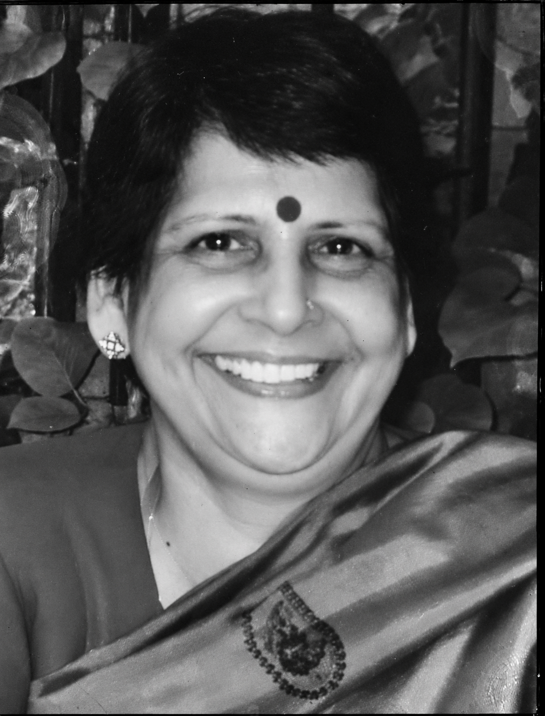 Decorative tribute image for Sudha Di; personal portrait not provided